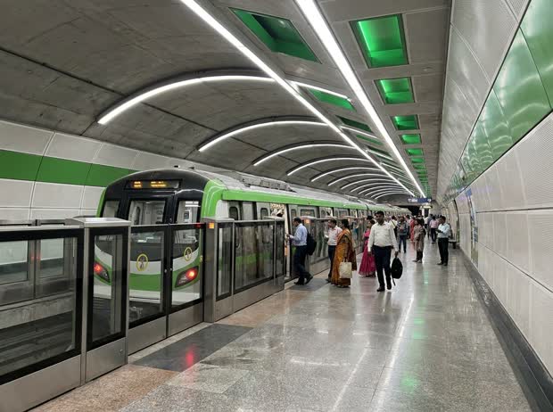 A Green Line metro train at an underground Kolkata platform